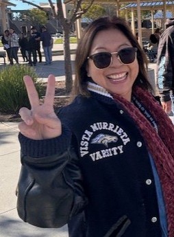 Guia Blaske wearing her Vista Murrieta varsity jacket
