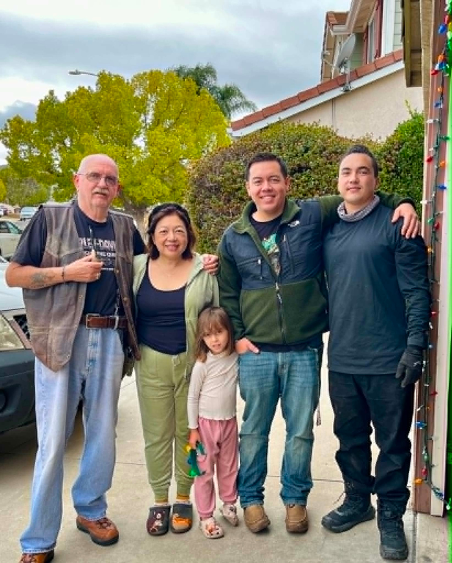 Guia Blaske with her husband, two sons, and granddaughter outside their Murrieta home